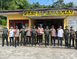 Peringati HUT Bhayangkara ke-79, Koramil 10/Lolowau Kunjungi dan Beri Kejutan di Polsek Lolowau.